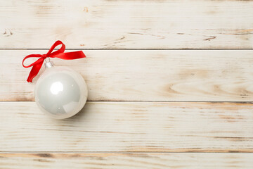 Christmas toy on wooden background, top view