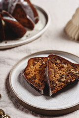 Pumpkin tangerine bundt cake with pumpkin spice and nuts for winter dinner. Selective focus