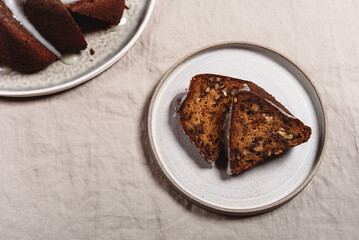 Pumpkin tangerine bundt cake with pumpkin spice and nuts for autumn fall dinner. Selective focus