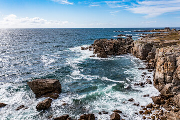 Fototapeta na wymiar Aerial landscape of ocean and rocks off the coast of France in Croisic.