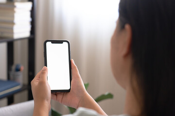 Blank mobile phone screen on woman hand. Smartphone mockup free space for text.