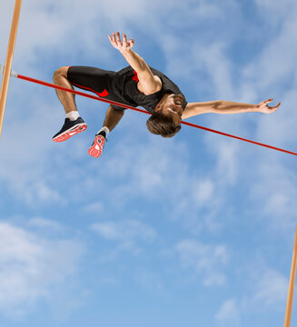 Man in action of high jump