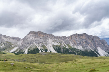 Landscape of the dolomites in the surroundings of Seceda on a cloudy day