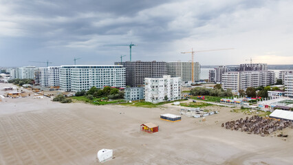 Evening beach in Romania. Drone view of Mamaia beach and hotels in Romania.