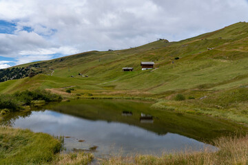 Landscape of the dolomites in the surroundings of Seceda on a cloudy day