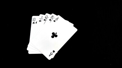 Casino playing card over black background isolation.