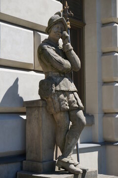 Statue of Guardsman on right side of side entrance to Pless Castle (Palace). Pszczyna, Poland.