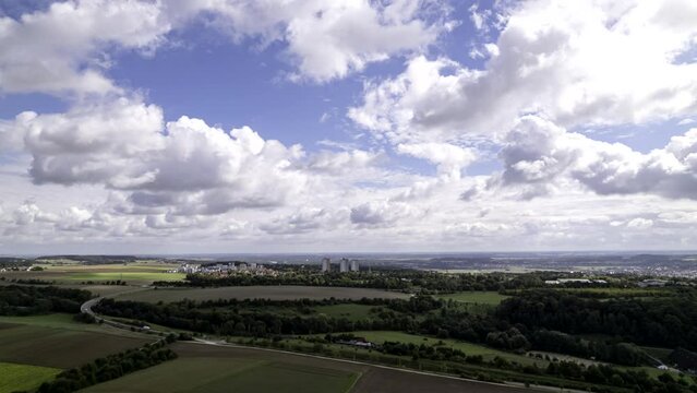Aerial time lapse shot of the residential area of B&ouml;fingen, a part of the city of Ulm. The camera movement is revealing the landscapes around Neu-Ulm in Bavaria