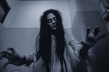 Portrait of asian woman make up ghost,Scary horror scene for background,Halloween festival...