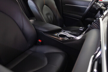 Car interior. Salon of a new modern car. Auto seats.