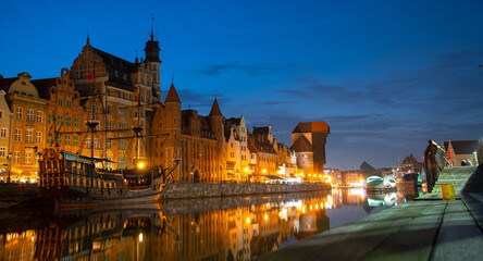 Fototapeta na wymiar Picturesque summer evening panorama of the architectural pier of the Old Town GDANSK, POLAND