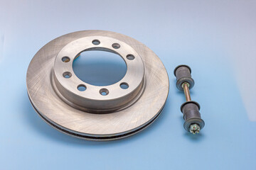 automotive parts and components of the brake system for completing mechanisms and repairing a car on a white milky background.