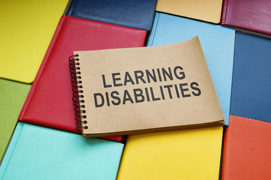 Learning disabilities sign in the notepad and books.