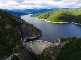 Obraz na płótnie Canvas Aerial view of the Vidraru Reservoir in the Fagaras Mountains in Romania