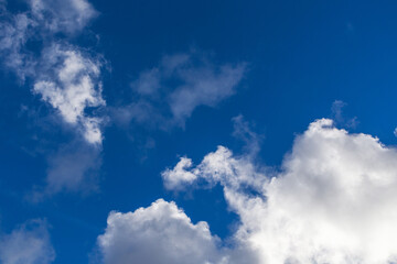 Background of blue sky with white clouds. Cloudy sky during the day