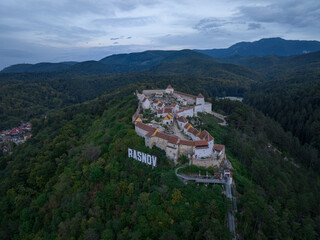 Fototapeta na wymiar Aerial view of Rasnov fortress near the city of Brasov in Romania