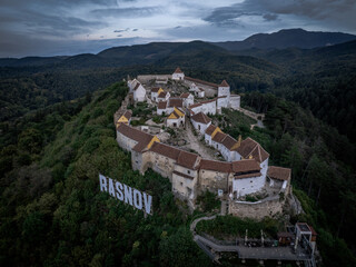 Fototapeta na wymiar Aerial view of Rasnov fortress near the city of Brasov in Romania