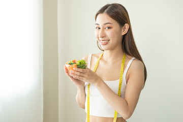 Diet, Dieting smiling asian young woman, girl holding fresh green salad of bowl, mix vegetable to eat food low fat for good health, body slim fit. Nutritionist female, Weight loss, lose for healthy.