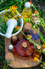 Obraz na płótnie Canvas Medicinal herbs and tinctures alternative medicine. Selective focus.