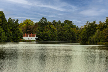 A boat house at Virginia Water lakes - part of Windsor Great Park, Surrey.
