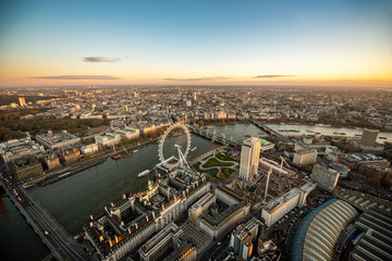aerial view of the city of london and the river thames, with the millennium wheel in the foreground - obrazy, fototapety, plakaty