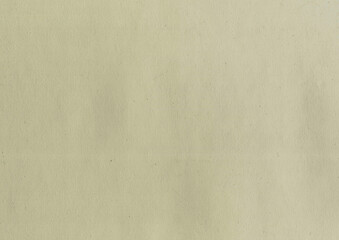 High quality scan top view of an old, uncoated, weathered, yellowed, green, beige paper texture background with small dust particles and fine grain fiber high resolution wallpaper