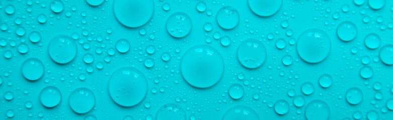 Drops of liquid, moisturizing cosmetic product. Hyaluronic acid. Selective focus.
