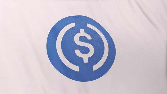 USDC USD Coin icon logo on white flag loop banner background. Concept 3D animation for cryptocurrency and fintech using blockchain technology to secure transactions in stock exchange DeFi market.