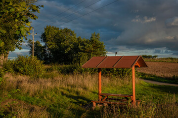 Hiking shelter near Rakovnik town and Rakovnicky creek in summer evening