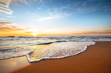 Papier peint photo Vagues de l'océan Shoot in the morning with amazing sunrise sky.  © vrstudio