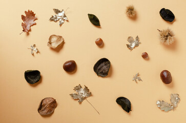 Fall pattern of autumn elements on orange background. Top view, copy space. Autumn concept. Autumn fall background.