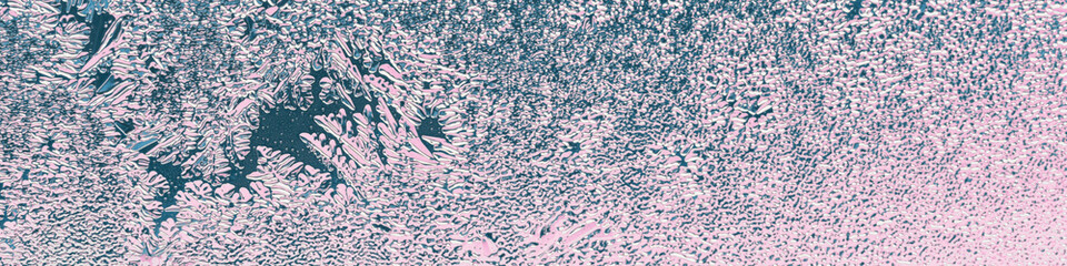 Frosting on a window glass in winter. Weather forecast. Blue and pink tinted banner. Abstract season heading. Christmas theme
