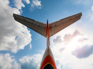 Malpensa, Italia. 21-06-2022 McDonnell Douglas' famous T-shaped tail seen from below. Historic...