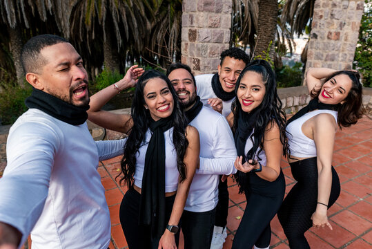 Group Of Friend At The Park Taking A Photo Selfie With Same Dress Code