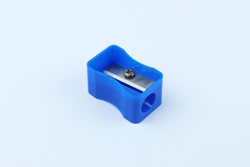 Blue plastic sharpener on white background