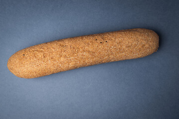 french fresh baguette bread on blue background