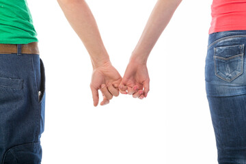 Young couple seen from behind holding hands isolated on transparent background