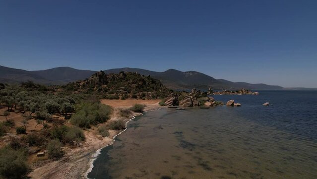 Lake Bafa is a lake and a nature reserve situated in southwestern. At the innermost north-east tip of the lake is the village of Kapikiri, as well as the ruins of Heraclea by Latmus.