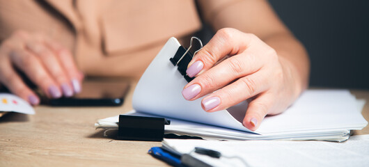 woman hands working in Stacks paper files