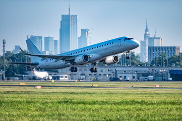 Fototapeta Passenger plane at the airport in Warsaw, Poland. obraz
