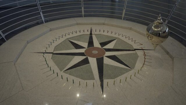 This video shows a pendulum swinging back and forth.