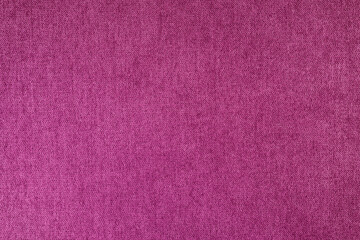 Fototapeta premium Texture background of velours purple fabric. Fabric texture of upholstery furniture textile material, design interior, wall decor. Fabric texture close up, backdrop, wallpaper.