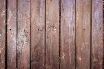 Brown painted natural wood with grains for background and texture.