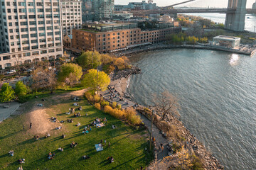 Fototapeta na wymiar Overhead View of Park in Dumbo, Brooklyn of New York City. Brooklyn Bridge and East river