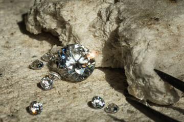 photo of round diamonds on the stone surface