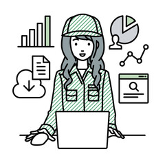 デスクでPCを前にリサーチ・データ分析・レポート作成をしている作業員の女性