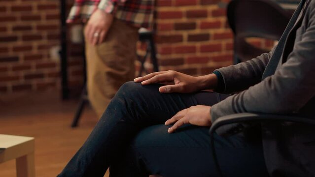 Therapist listening to man complaining about marriage, attending couple therapy session to give counseling advice. Psychiatrist doing relationship psychoanalysis to help. Close up.