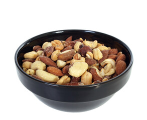 Bowl of deluxe, mixed, salted nuts isolated.
