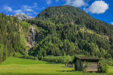 Fototapeta na wymiar Waterfall in Stubai Valley, Grawa Wasserfall, North Tyrol, Austria