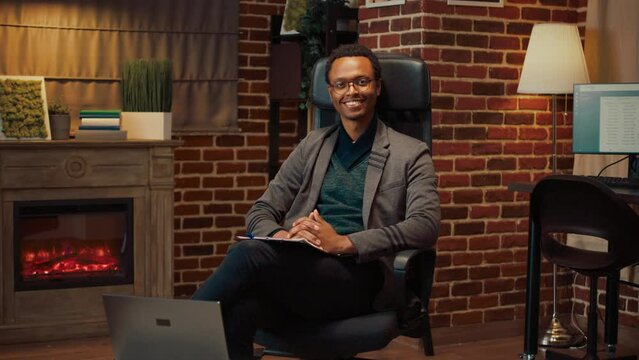 Portrait of african american psychologist in office, preparing for therpay session consultation. Giving counseling assistance to help with relationship problems, psychiatry guidance.